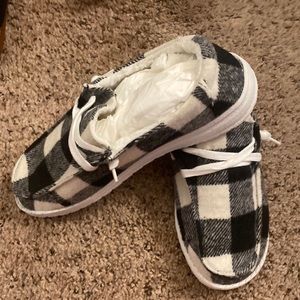 Black and white slip on shoe